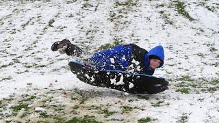 Snow day a heyday for young sledders at Jim Brown Park [upl. by Gunther]