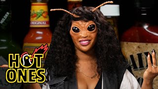 SZA Bugs Out While Eating Spicy Wings  Hot Ones [upl. by Erdnassak]