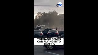 Tornado sends car flying into oncoming traffic [upl. by Carlock]