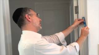 How to put up a mezuzah by Rabbi Kauffman [upl. by Gardner]