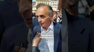 Eric Zemmour frappe une femme qui vient de lui jeter un œuf sur un marché en Corse [upl. by Spanjian]