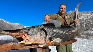 A Giant Sturgeon Roasted Under A Barrel In A Bonfire Dinner In A Snowy Village [upl. by Saudra465]