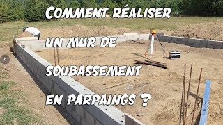 Comment réaliser un mur de soubassement en parpaings [upl. by Aisatsanna]