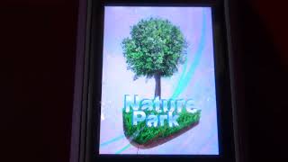 Nature Park game from Nokia Asha 202 on Nokia 7310 Supernova [upl. by Aicatsana]