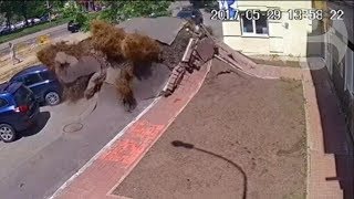 Underground water pipe explosion destroys road in Ukraine [upl. by Spoor]