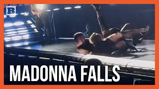 65YearOld Madonna Falls Off Chair Being Pulled by Man Running in Heels [upl. by Osyth]