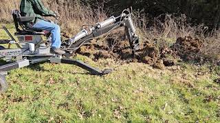 Jansen MB300 Baby Backhoe vs Cedar Stump [upl. by Aynekat863]