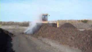 Windrow Composting Turner Sewage Sludge and Yard Waste Organic Soil Amendments Landfill Diversion [upl. by Lebasile787]