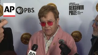 Elton John talks about his music catalogue and humanitarian work [upl. by Sadowski]