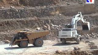 Liebherr R 984C amp Caterpillar 775F in a Quarry  Steinbruch Germany 23052007 [upl. by Anassor59]