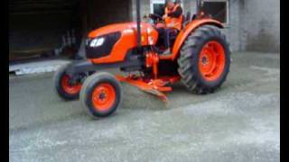 Neilo Kubota M7040 Tractor Grader in operation in restricted space [upl. by Curt228]