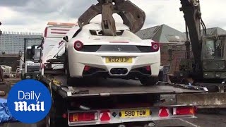 Ferrari crushed after police seize uninsured supercar  Daily Mail [upl. by Ahsemo62]