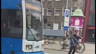 Oszołom rzuca rowerem w tramwaj  Agresja drogowa  Idiot throws own bike at tram  Poland [upl. by Lertnek]