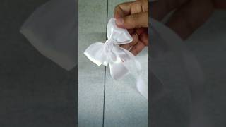 How to tie a perfect satin bow  DIY Bow using ribbon  ribbonbows bow [upl. by Macintyre]