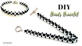 how to make a beaded bracelet white and black beaded bracelet beginner beading project [upl. by Doi]