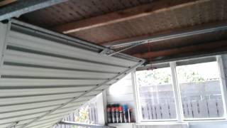 tilt garage door with newly installed Merlin garage door opener [upl. by Faun]