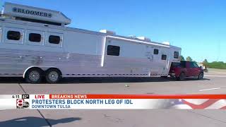 Truck and trailer drive through crowd protesting in Tulsa on live TV [upl. by Keyte334]