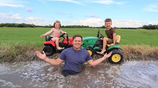 Playing in the mud and watering hay with kids tractors  Tractors for kids [upl. by Inan708]