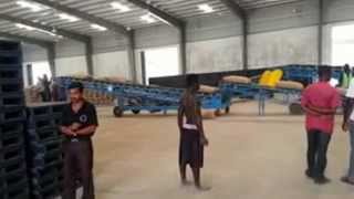 Conceyor amp Stacker in Cocoa Board Warehouse Ghana [upl. by Eelyah]