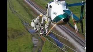 Helicopter Transfering Lineman to Wire [upl. by Dasya]