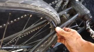 How to true a bike wheel at home without wheel stand [upl. by Ardnad501]