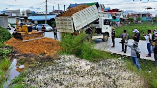 Excellent work 5Ton Filling Land Truck Dozer Komatsu D31P pushing soil stuck on the road Mix VDO [upl. by Mahalia]