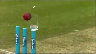 Murlidharan vs graham swann  Murlidharan hits coin on glass with ball  Murlidharan coin hitting [upl. by Tesler]