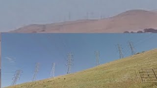 An army of pylon transmission towers on a mountain [upl. by Isus]