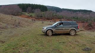 Kia Sorento off road Toyota Land Cruiser mud uphill [upl. by Kosiur957]