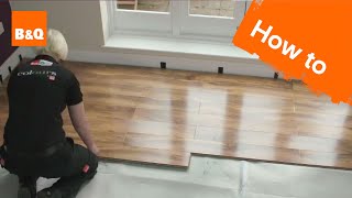 How to lay flooring part 3 laying locking laminate [upl. by Broek]