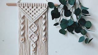 Macrame wall hanging tutorial  Easy beginner DIY [upl. by Sitoiyanap]