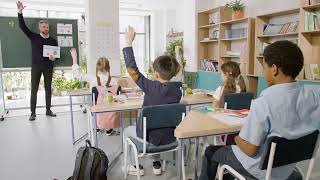 Teacher teaches a multiethnic students group the words low and high in english classroom [upl. by Lrig]