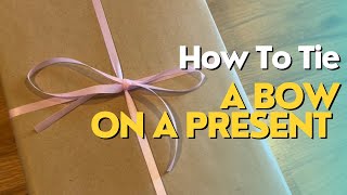 How to Tie a Bow on a Present [upl. by Eillo]