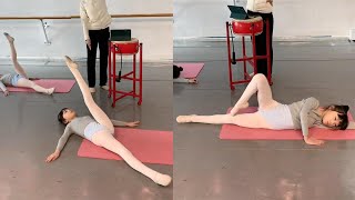 Dance students doing leg stretching exercisesDance Student Group Training Video [upl. by Nosnibor981]