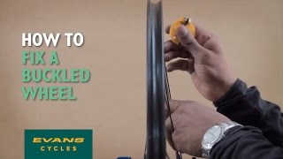 How to fix a buckled wheel [upl. by Sofko]