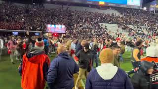 Auburn storms field after 4341 win over Texas AampM [upl. by Adnalram]