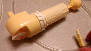 How to Assemble Medela Hand Pump [upl. by Ylrehc]