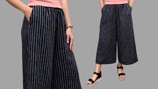 Cutting and sewing wide leg pants with pockets  Easy instructions for sewing beautiful pants [upl. by Gona]