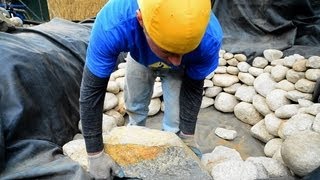 How to build a Fish Pond  Part 8  Pond Construction Rock Placement 1 of 2 [upl. by Zosema]