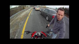 Motorcycle traffic violation  Cop pulls out gun [upl. by Yoo]