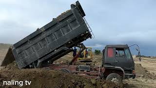 Fuso dump truck 10 wheeler 8DC9 double leff unloading soil [upl. by Philpot]