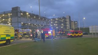 Firefighters and police at Luton Airport after car park fire  AFP [upl. by Gavrielle633]