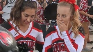 Football players kind gesture to cheerleader goes viral [upl. by Marih866]