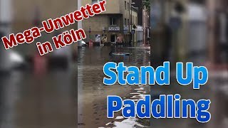 Köln Mit dem Surfbrett durch das Unwetter [upl. by Stubbs359]