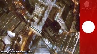 Night base jump in NYC Skydivers plunge from One World Trade Center [upl. by Alletsyrc122]