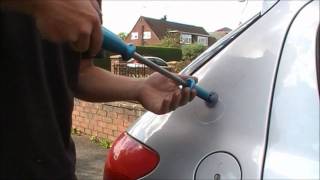 TDL Dent amp Scratch Repair how to remove a car dent with paintless dent removal [upl. by Bjorn]