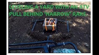 Leveling a yard with an ATV pull behind quotharrowquot rake [upl. by Dnomsed]