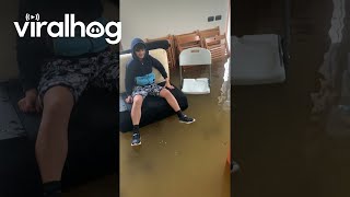 Floating Couch In Flooded Home  ViralHog [upl. by Nolrak]