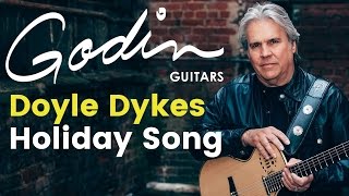 Doyle Dykes plays a holiday song at the Godin Studios [upl. by Pierrette]