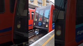 DLR units enter and depart from Limehouse station DLR train mindthegap londontransport railway [upl. by Ayikat]